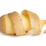 Potatoes with peel isolated on white background